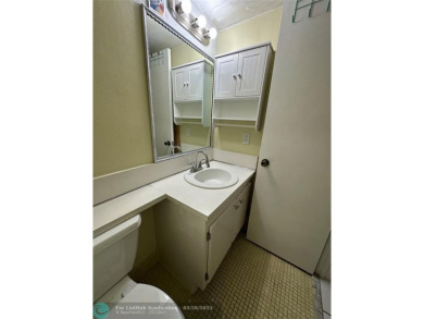 UNIT WITH NEW AIR CONDITIONING, NEW WATER HEATER, NEW FRENCH on Hillsboro Pines Golf in Florida - for sale on GolfHomes.com, golf home, golf lot