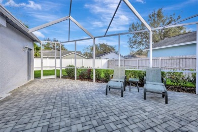 This beautifully maintained 4-bedroom home has been lovingly on Hunters Green Country Club in Florida - for sale on GolfHomes.com, golf home, golf lot