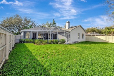 This beautifully maintained 4-bedroom home has been lovingly on Hunters Green Country Club in Florida - for sale on GolfHomes.com, golf home, golf lot