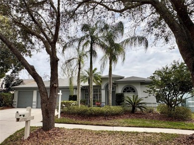 This beautifully maintained 4-bedroom home has been lovingly on Hunters Green Country Club in Florida - for sale on GolfHomes.com, golf home, golf lot