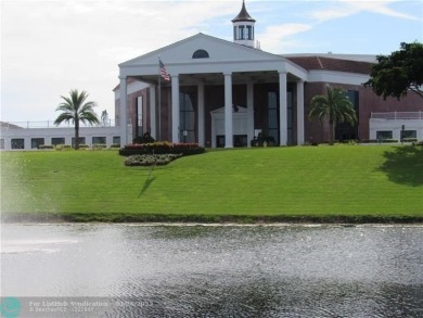UNIT WITH NEW AIR CONDITIONING, NEW WATER HEATER, NEW FRENCH on Hillsboro Pines Golf in Florida - for sale on GolfHomes.com, golf home, golf lot