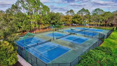 This beautifully maintained 4-bedroom home has been lovingly on Hunters Green Country Club in Florida - for sale on GolfHomes.com, golf home, golf lot