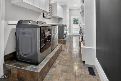 Welcome to 53 Davis Love Drive, an exceptional golf course on The Preserve At Jordan Lake Golf Club in North Carolina - for sale on GolfHomes.com, golf home, golf lot