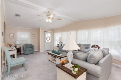 Welcome to this charming 2-bedroom, 2-bathroom manufactured home on Barefoot Bay Golf Course in Florida - for sale on GolfHomes.com, golf home, golf lot