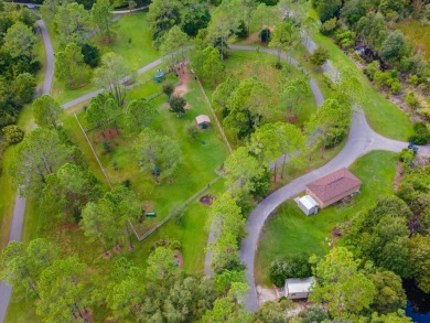 This beautifully maintained 4-bedroom home has been lovingly on Hunters Green Country Club in Florida - for sale on GolfHomes.com, golf home, golf lot