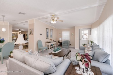 Welcome to this charming 2-bedroom, 2-bathroom manufactured home on Barefoot Bay Golf Course in Florida - for sale on GolfHomes.com, golf home, golf lot