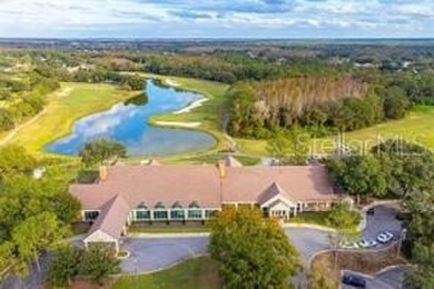 This beautifully maintained 4-bedroom home has been lovingly on Hunters Green Country Club in Florida - for sale on GolfHomes.com, golf home, golf lot