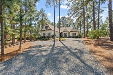Nestled on the golf course in the gated community of Seven Lakes on Beacon Ridge Golf and Country Club in North Carolina - for sale on GolfHomes.com, golf home, golf lot