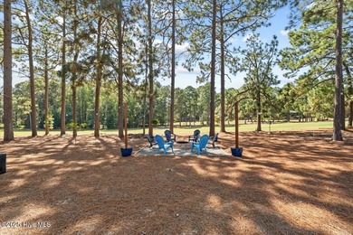 Nestled on the golf course in the gated community of Seven Lakes on Beacon Ridge Golf and Country Club in North Carolina - for sale on GolfHomes.com, golf home, golf lot