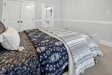 Welcome to 53 Davis Love Drive, an exceptional golf course on The Preserve At Jordan Lake Golf Club in North Carolina - for sale on GolfHomes.com, golf home, golf lot