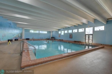 UNIT WITH NEW AIR CONDITIONING, NEW WATER HEATER, NEW FRENCH on Hillsboro Pines Golf in Florida - for sale on GolfHomes.com, golf home, golf lot