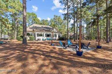 Nestled on the golf course in the gated community of Seven Lakes on Beacon Ridge Golf and Country Club in North Carolina - for sale on GolfHomes.com, golf home, golf lot