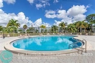 UNIT WITH NEW AIR CONDITIONING, NEW WATER HEATER, NEW FRENCH on Hillsboro Pines Golf in Florida - for sale on GolfHomes.com, golf home, golf lot