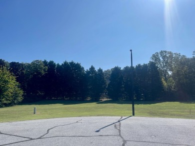 Nestled within the serene, gated golf community of Stoney Point on The Links At Stoney Point in South Carolina - for sale on GolfHomes.com, golf home, golf lot