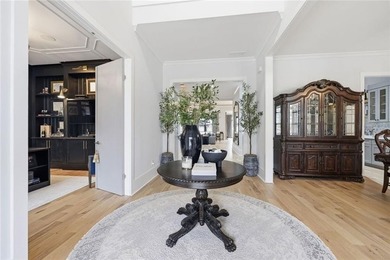 Situated within the prestigious Indian Hills Country Club on Indian Hills Country Club in Georgia - for sale on GolfHomes.com, golf home, golf lot