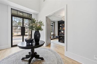 Situated within the prestigious Indian Hills Country Club on Indian Hills Country Club in Georgia - for sale on GolfHomes.com, golf home, golf lot