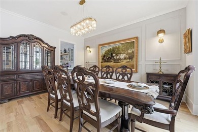 Situated within the prestigious Indian Hills Country Club on Indian Hills Country Club in Georgia - for sale on GolfHomes.com, golf home, golf lot