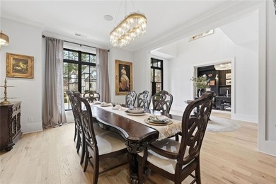 Situated within the prestigious Indian Hills Country Club on Indian Hills Country Club in Georgia - for sale on GolfHomes.com, golf home, golf lot