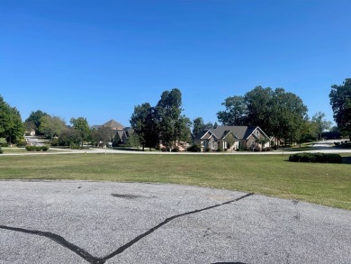 Nestled within the serene, gated golf community of Stoney Point on The Links At Stoney Point in South Carolina - for sale on GolfHomes.com, golf home, golf lot