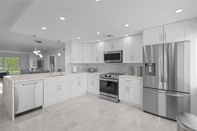 Spacious 2/2 corner unit on the second floor with a serene on Wynmoor Golf Course in Florida - for sale on GolfHomes.com, golf home, golf lot