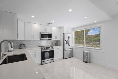 Spacious 2/2 corner unit on the second floor with a serene on Wynmoor Golf Course in Florida - for sale on GolfHomes.com, golf home, golf lot