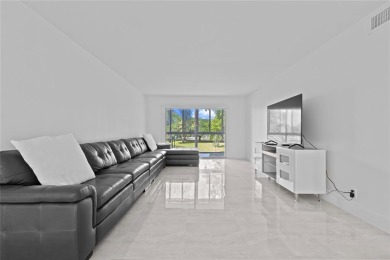 Spacious 2/2 corner unit on the second floor with a serene on Wynmoor Golf Course in Florida - for sale on GolfHomes.com, golf home, golf lot