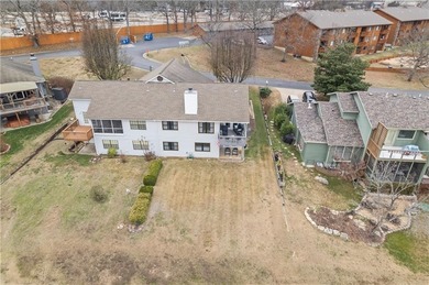 Located along the 13th and 14th fairways, this townhome offers on Pointe Royale Village Country Club in Missouri - for sale on GolfHomes.com, golf home, golf lot