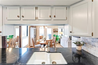 Located along the 13th and 14th fairways, this townhome offers on Pointe Royale Village Country Club in Missouri - for sale on GolfHomes.com, golf home, golf lot