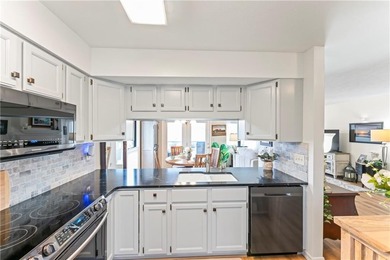 Located along the 13th and 14th fairways, this townhome offers on Pointe Royale Village Country Club in Missouri - for sale on GolfHomes.com, golf home, golf lot