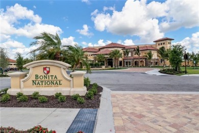 BEAUTIFUL, IMMACULATE & PRICED RIGHT! This end-unit COACH HOME on Bonita National Golf Course in Florida - for sale on GolfHomes.com, golf home, golf lot