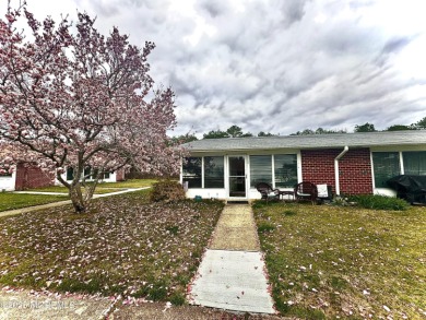 Move right in to this updated 2-bedroom, 1-bath end unit in on Greenbriar Woodlands in New Jersey - for sale on GolfHomes.com, golf home, golf lot