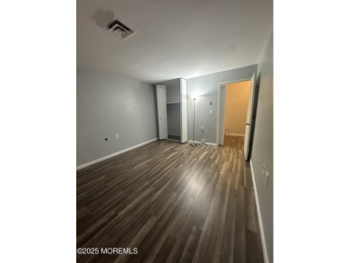 Move right in to this updated 2-bedroom, 1-bath end unit in on Greenbriar Woodlands in New Jersey - for sale on GolfHomes.com, golf home, golf lot