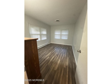 Move right in to this updated 2-bedroom, 1-bath end unit in on Greenbriar Woodlands in New Jersey - for sale on GolfHomes.com, golf home, golf lot