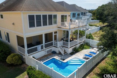 *Seas the day* is a beautifully maintained reverse-floor plan on The Currituck Golf Club in North Carolina - for sale on GolfHomes.com, golf home, golf lot
