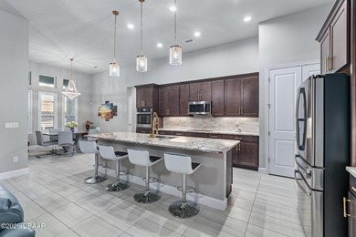 Welcome to 301 Stirling Bridge Drive, where breathtaking western on Plantation Bay Golf and Country Club in Florida - for sale on GolfHomes.com, golf home, golf lot