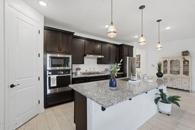 Step into this well-maintained Craftsman-style home in Verrado on Verrado Golf Club  in Arizona - for sale on GolfHomes.com, golf home, golf lot