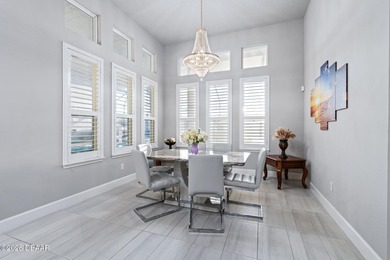 Welcome to 301 Stirling Bridge Drive, where breathtaking western on Plantation Bay Golf and Country Club in Florida - for sale on GolfHomes.com, golf home, golf lot