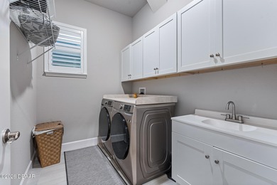 Welcome to 301 Stirling Bridge Drive, where breathtaking western on Plantation Bay Golf and Country Club in Florida - for sale on GolfHomes.com, golf home, golf lot