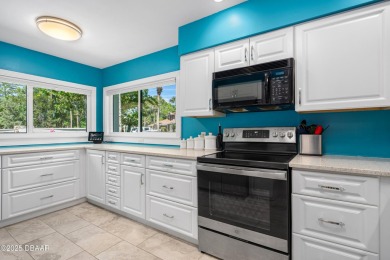 Immaculate 2BR/2BA End Unit with Golf Course Views on a Quiet on The Club At Pelican Bay - North Course in Florida - for sale on GolfHomes.com, golf home, golf lot
