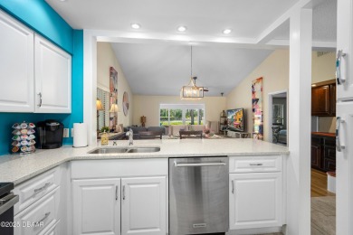 Immaculate 2BR/2BA End Unit with Golf Course Views on a Quiet on The Club At Pelican Bay - North Course in Florida - for sale on GolfHomes.com, golf home, golf lot