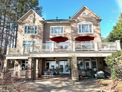 Lake life at its finest!  Welcome to this beautiful all brick on The Patriot Golf Club At Grand Harbor in South Carolina - for sale on GolfHomes.com, golf home, golf lot