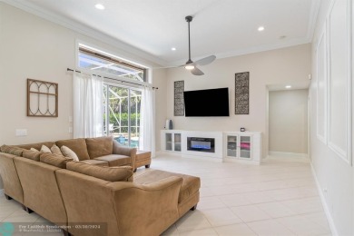 Just reduced! Desirable Grand Cayman model with Screened-in pool on Binks Forest Golf Club in Florida - for sale on GolfHomes.com, golf home, golf lot