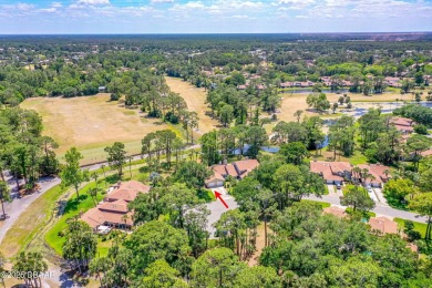Immaculate 2BR/2BA End Unit with Golf Course Views on a Quiet on The Club At Pelican Bay - North Course in Florida - for sale on GolfHomes.com, golf home, golf lot