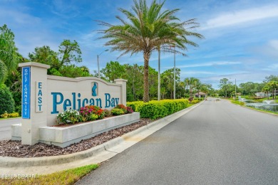 Immaculate 2BR/2BA End Unit with Golf Course Views on a Quiet on The Club At Pelican Bay - North Course in Florida - for sale on GolfHomes.com, golf home, golf lot