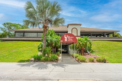Immaculate 2BR/2BA End Unit with Golf Course Views on a Quiet on The Club At Pelican Bay - North Course in Florida - for sale on GolfHomes.com, golf home, golf lot