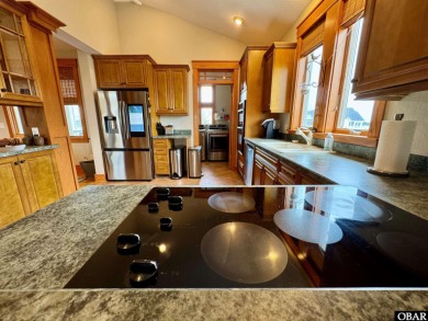 Welcome to 742 Hammock Lane, a stunning coastal retreat tucked on The Currituck Golf Club in North Carolina - for sale on GolfHomes.com, golf home, golf lot