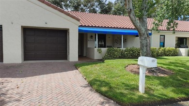 One or more photo(s) has been virtually staged. This villa at on Mainlands Golf Club in Florida - for sale on GolfHomes.com, golf home, golf lot