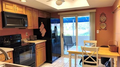 One or more photo(s) has been virtually staged. This villa at on Mainlands Golf Club in Florida - for sale on GolfHomes.com, golf home, golf lot