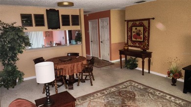 One or more photo(s) has been virtually staged. This villa at on Mainlands Golf Club in Florida - for sale on GolfHomes.com, golf home, golf lot