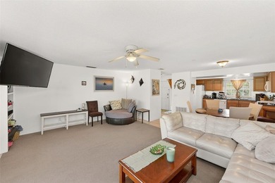 Wake up to sweeping golf course views in this bright, breezy on East Bay Golf Club in Florida - for sale on GolfHomes.com, golf home, golf lot